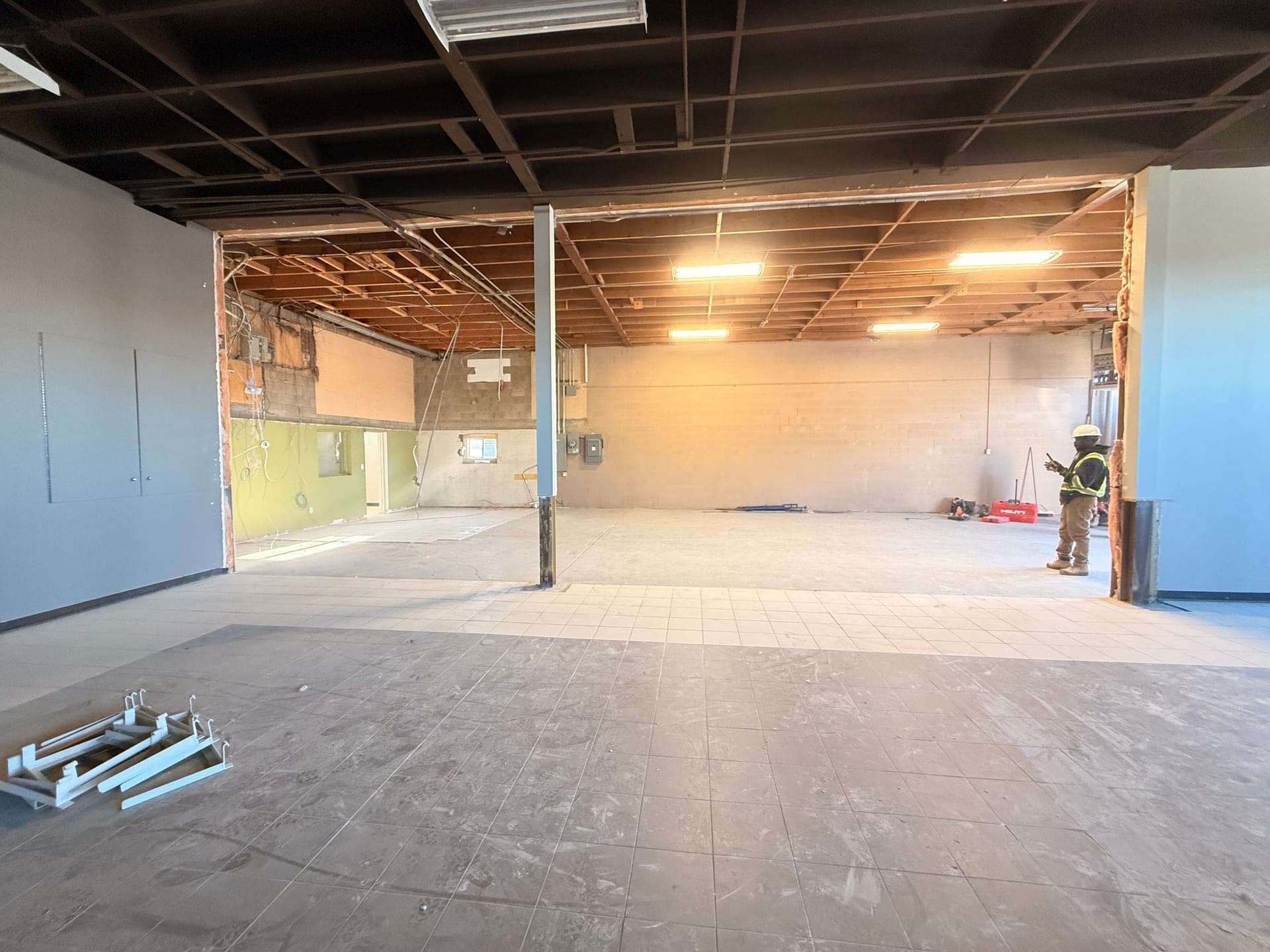 Commercial Interior Demolition & Mezzanine Removal: Patio Line at 6227 Centre Street S