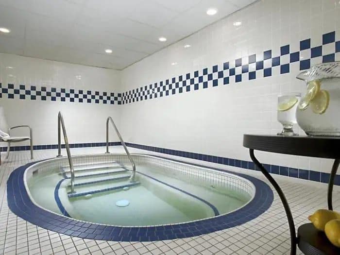 Hospitality Interior Demolition: Spa & Hot Tub Removal at the Blackfoot Hotel - Image 4