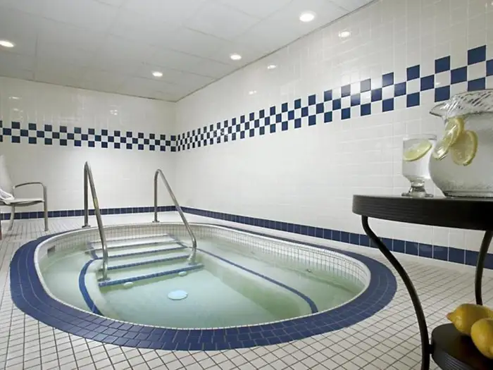 Hospitality Interior Demolition: Spa & Hot Tub Removal at the Blackfoot Hotel