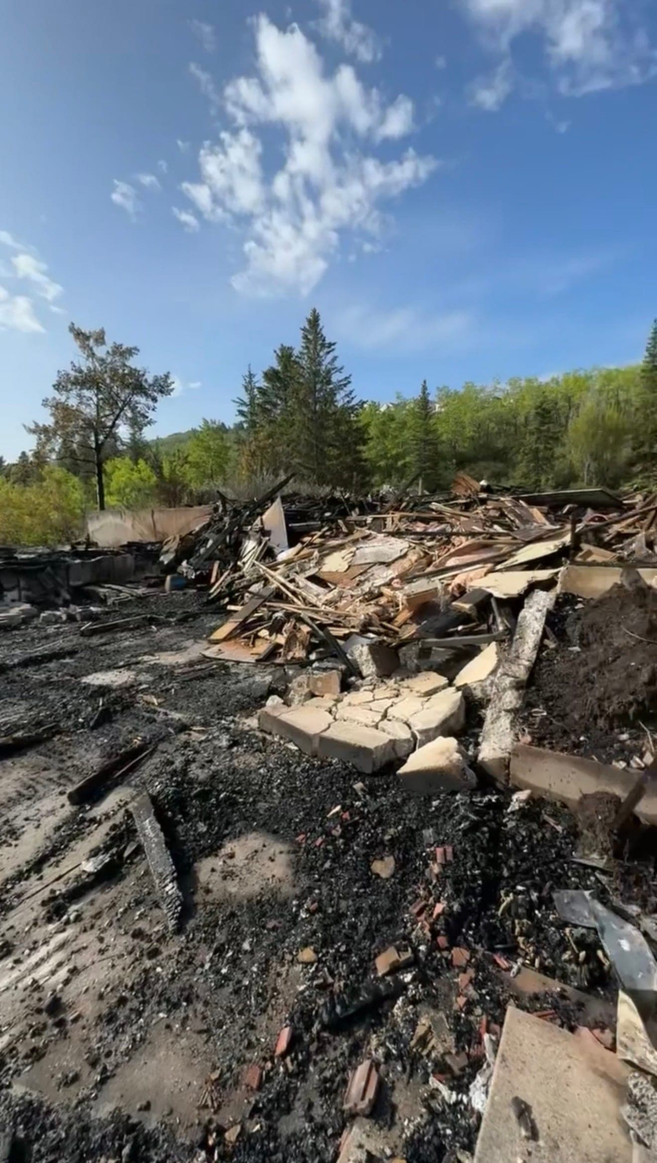 Residential Fire Damage Demolition: Emergency Site Clearance at 114 Short Road NW, Calgary