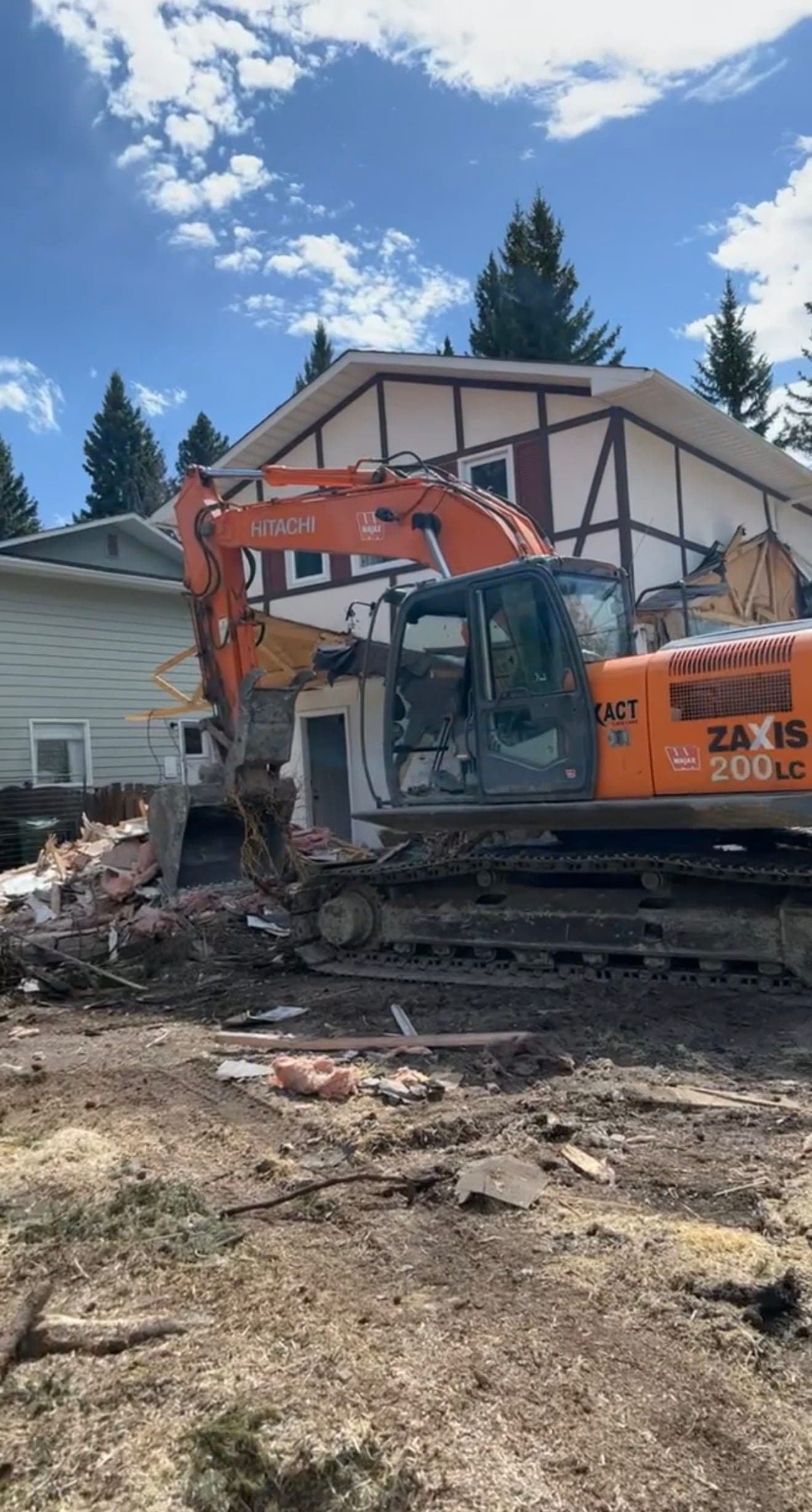 Full Residential House Demolition: Site Clearance at 8940 Bayridge Drive SW, Calgary - Image 2